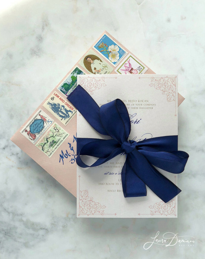 Wedding invitation with a blue bow
